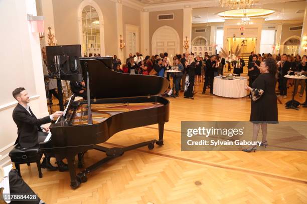 Jeff Cubeta and Aisha DeHaas performs at Single Parent Resource Center's 2019 Fall Fete at Cosmopolitan Club on October 03, 2019 in New York City.