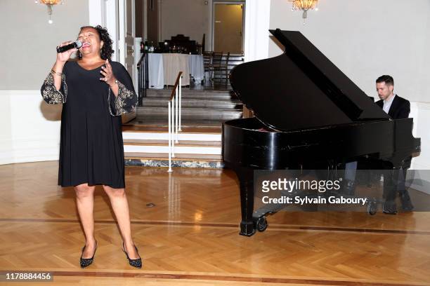 Aisha DeHaas and Jeff Cubeta perform at Single Parent Resource Center's 2019 Fall Fete at Cosmopolitan Club on October 03, 2019 in New York City.