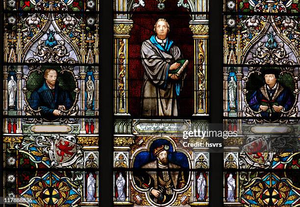 stained glass window with martin luther - protestantism stock pictures, royalty-free photos & images