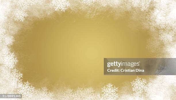 abstract winter background with snowflakes and ice on gold color basic - january background stock pictures, royalty-free photos & images