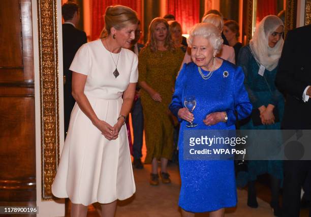 Queen Elizabeth II and Sophie, Countess of Wessex attend a reception to celebrate the work of the Queen Elizabeth Diamond Jubilee Trust at Buckingham...