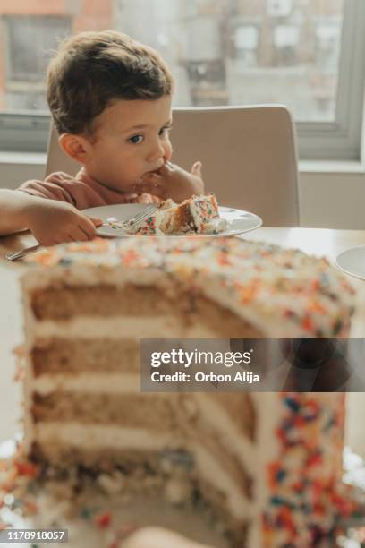 boy celebrating his third birthday - kids birthday cake stock pictures, royalty-free photos & images