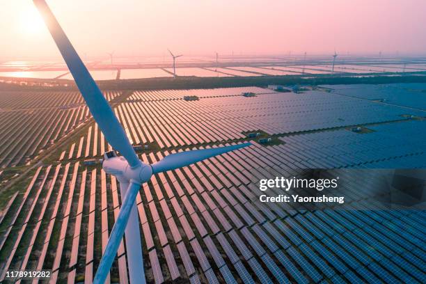 industrial landscape with different energy resources. sustainable development. - wind turbines stock-fotos und bilder