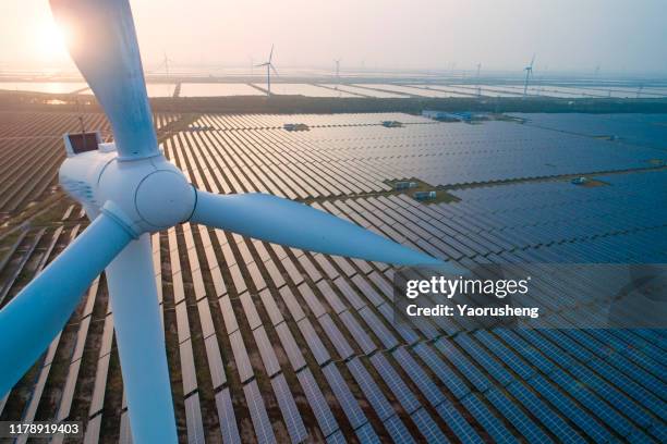 industrial landscape with different energy resources. sustainable development. - renewable energy stockfoto's en -beelden