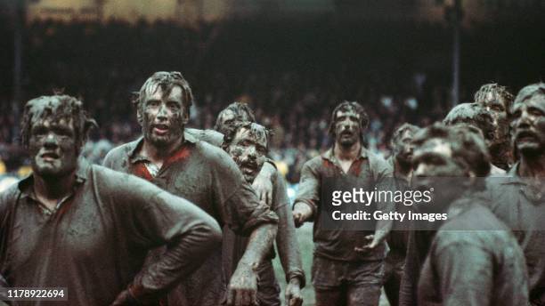 Fran Cotton in the foreground of a mud covered British Lions lineout along with Moss Keane Phil Orr and Jeff Squire against New Zealand Juniors who...