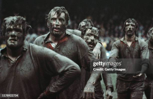 Fran Cotton in the foreground of a mud covered British Lions lineout along with Moss Keane Phil Orr and Jeff Squire against New Zealand Juniors who...