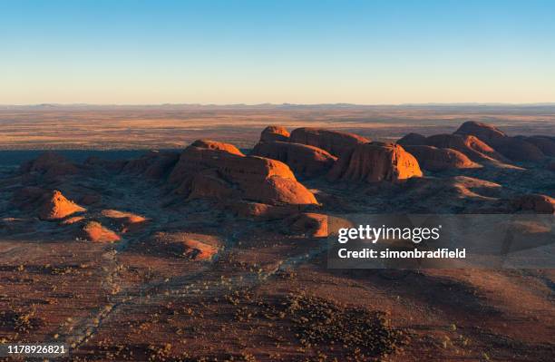 aerial view of kata tjuta in the evening sun - uluru-kata tjuta national park stock pictures, royalty-free photos & images