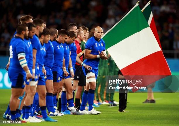 Sergio Parisse of Italy during the national anthem prior to the Rugby World Cup 2019 Group B game between South Africa v Italy at Shizuoka Stadium...