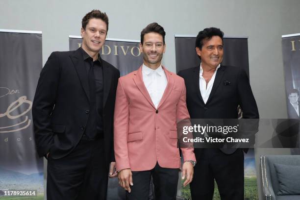 David Miller, Urs Buhler and Carlos Marin of British band Il Divo attend a press conference as part of the Timeless World Tour 15th Anniversary at St...