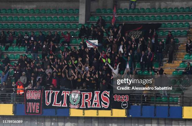 Crotone fans cheer during the Serie B match between AC Chievo Verona and FC Crotone at Stadio Marcantonio Bentegodi on October 29, 2019 in Verona,...