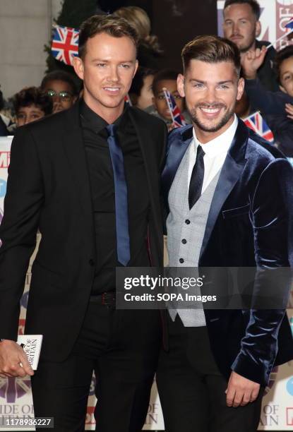 Kieron Richardson and a guest on the red carpet at The Daily Mirror Pride of Britain Awards, in partnership with TSB, at the Grosvenor House Hotel,...