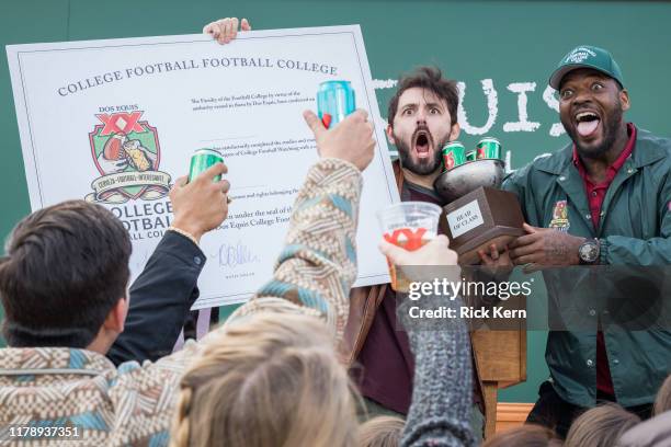 Football star Martellus Bennett quizzes football fans at the Dos Equis College Football Football College Bowl Game October 26, 2019 in College...