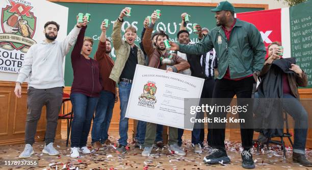 Football star Martellus Bennett quizzes football fans at the Dos Equis College Football Football College Bowl Game October 26, 2019 in College...