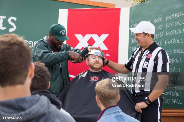 Football star Martellus Bennett quizzes football fans at the Dos Equis College Football Football College Bowl Game October 26, 2019 in College...