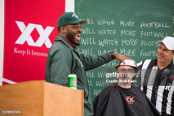 Football star Martellus Bennett quizzes football fans at the Dos Equis College Football Football College Bowl Game October 26, 2019 in College...