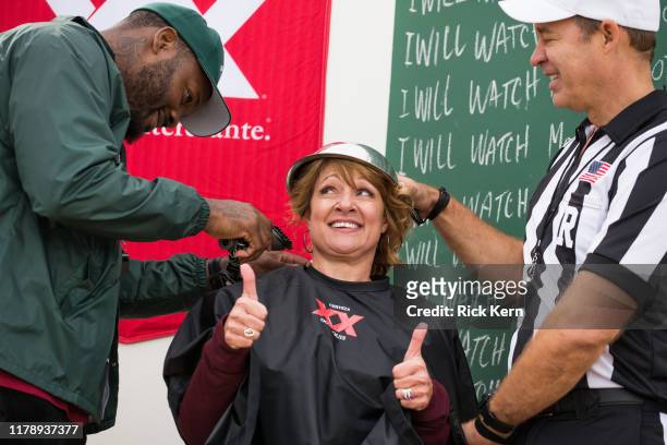 Football star Martellus Bennett quizzes football fans at the Dos Equis College Football Football College Bowl Game October 26, 2019 in College...
