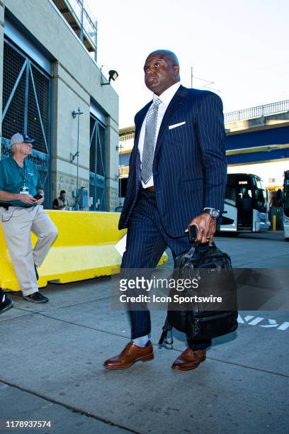 Monday Night Football commentator Booger McFarland walks into heinz field before the NFL football game between the Miami Dolphins and the Pittsburgh...