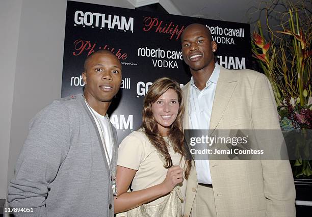 Sebastian Telfair of the Boston Celtics with Al Harrington of the Atlanta Hawks