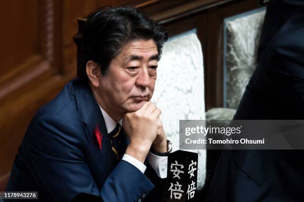 Japan's Prime Minister Shinzo Abe attends a plenary session at the lower house of the parliament on October 4, 2019 in Tokyo, Japan. The 200th...