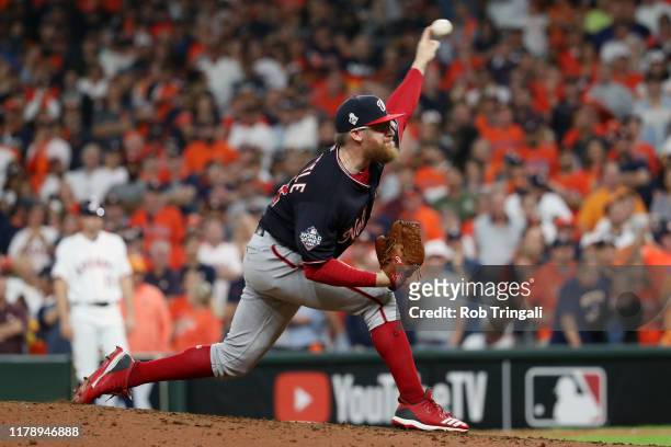 Sean Doolittle of the Washington Nationals pitches during Game 6 of the 2019 World Series between the Washington Nationals and the Houston Astros at...