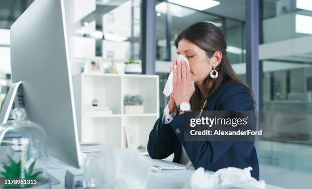 sick days at the office are the worst - facial tissue stock pictures, royalty-free photos & images