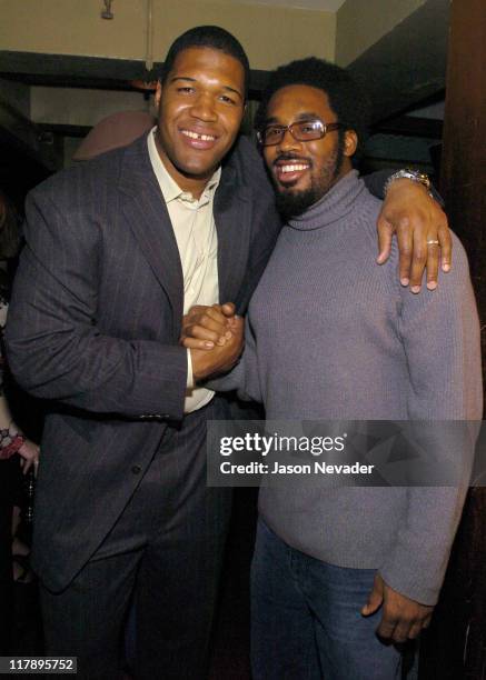 Michael Strahan and Dhani Jones of the New York Giants