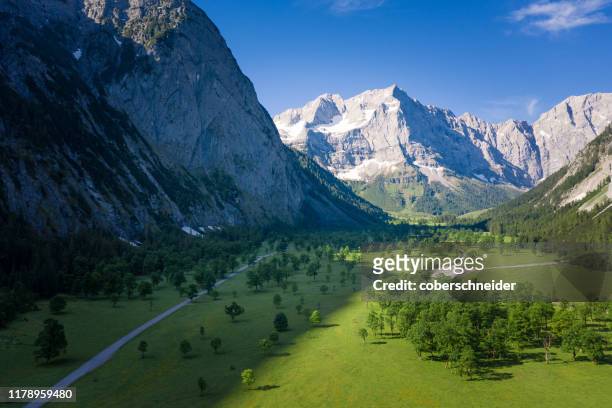 karwendel mountain and valley landscape, scharnitz, tyrol, austria - karwendel stock-fotos und bilder
