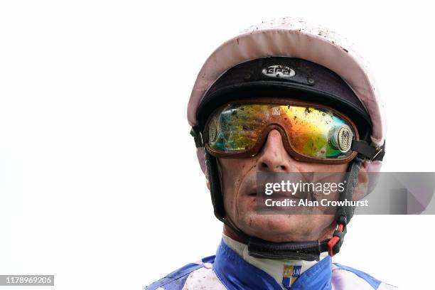 Muddy Gerald Mosse on a wet day at Ascot Racecourse on October 04, 2019 in Ascot, England.