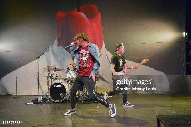 Matty Best, Kellin Quinn and Justin Hills of Sleeping With Sirens perform on stage during "Threesome Tour" at The Fillmore Miami Beach on October 29,...