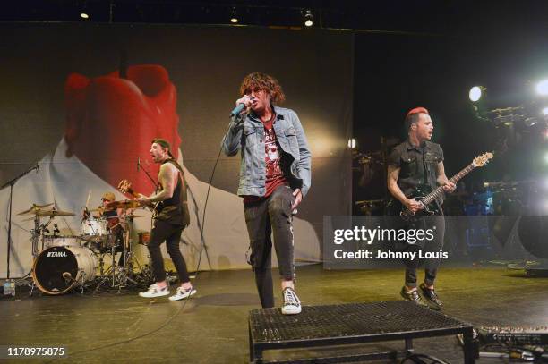 Matty Best, Justin Hills, Kellin Quinn and Nick Martin of Sleeping With Sirens perform on stage during "Threesome Tour" at The Fillmore Miami Beach...