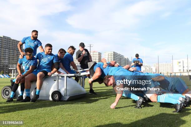 Matt Todd and the All Blacks forwards run through scrum drills during a New Zealand training session at the Arcs Urayasu Park on October 04, 2019 in...