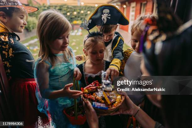 trick or treating - princess pirates stock pictures, royalty-free photos & images