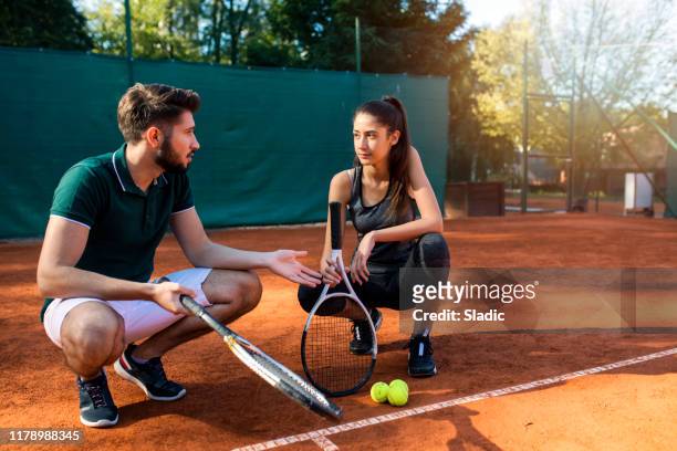 winning team - young tennis player stock pictures, royalty-free photos & images