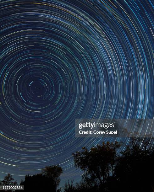 star trails with north star - long exposure stars stock pictures, royalty-free photos & images