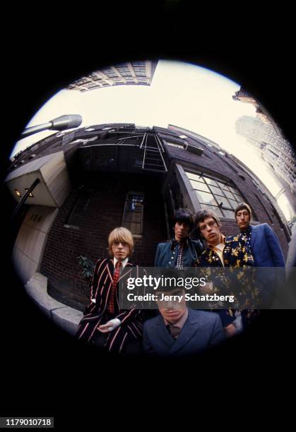 Portrait, via a fish-eye lens, of the members of English Rock band the Rolling Stones, New York, New York, September 10, 1966. The photo was later...