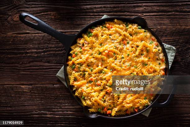 cheesy pasta skillet - frying pan from above stock pictures, royalty-free photos & images