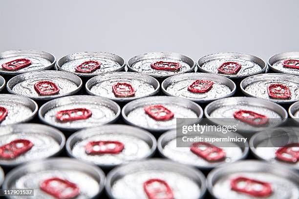 close-up of dozens of drink cans - drinks can stock pictures, royalty-free photos & images