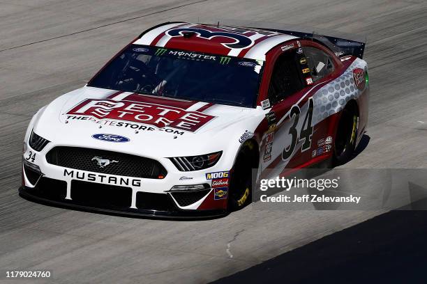 Michael McDowell, driver of the The Pete Store Ford, drives during practice for the Monster Energy NASCAR Cup Series Drydene 400 at Dover...