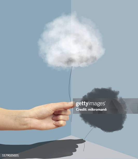 hand holding a cloud with a shadow - clouds transparent stock pictures, royalty-free photos & images