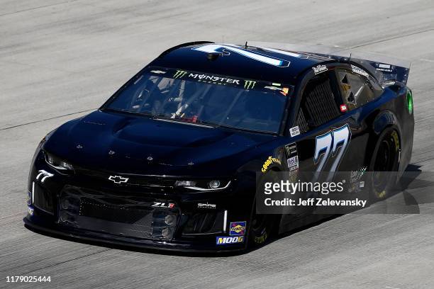 Reed Sorenson, driver of the Chevrolet, drives during practice for the Monster Energy NASCAR Cup Series Drydene 400 at Dover International Speedway...