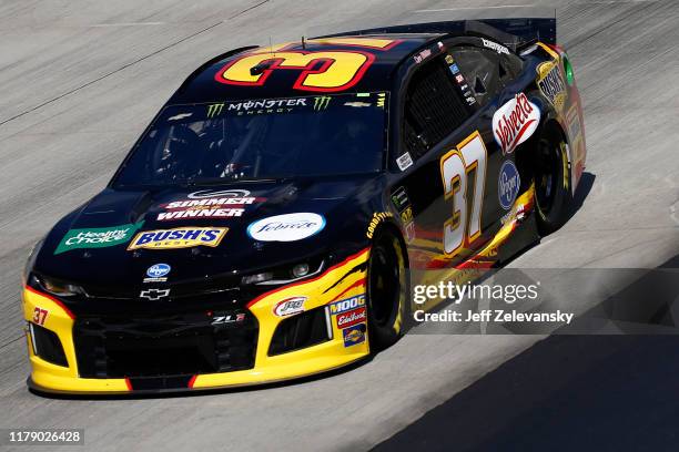 Chris Buescher, driver of the Kroger Simmer Like A Winner Chevrolet, drives during practice for the Monster Energy NASCAR Cup Series Drydene 400 at...