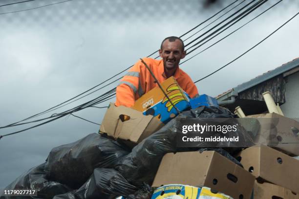 garbage collector - garbage truck driving stock pictures, royalty-free photos & images