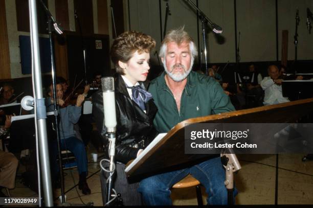 Sheena Easton and Kenny Rogers record at Capitol Records circa 1983.