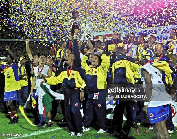 The Colombian team celebrates during the award ceremony on July 29, 2001 in the Nemesio Camacho Stadium in Bogota, Colombia. Colombia beat Mexico...