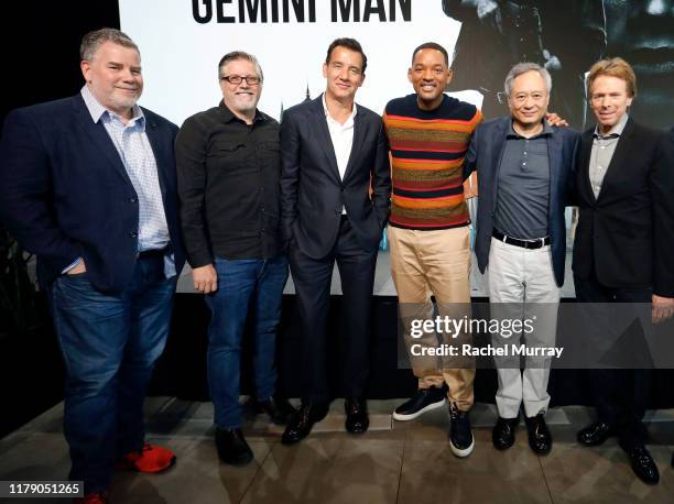 Weta Digital VFX supervisor Guy Williams and VFX supervisor Bill Westenhofer, actors Clive Owen and Will Smith, director Ang Lee, and producer Jerry...