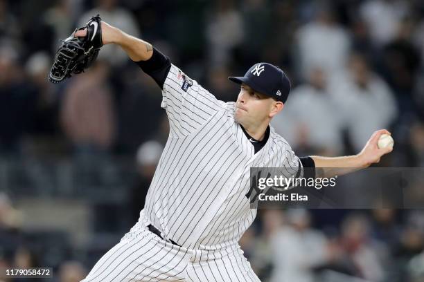 James Paxton of the New York Yankees throws a pitch against the Minnesota Twins during the first inning in game one of the American League Division...