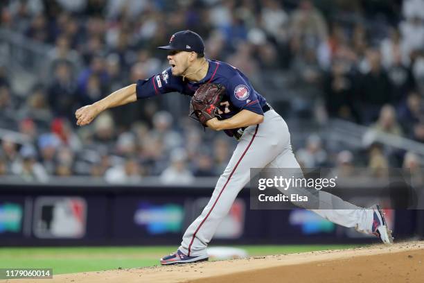 Jose Berrios of the Minnesota Twins throws a pitch against the New York Yankees during the first inning in game one of the American League Division...