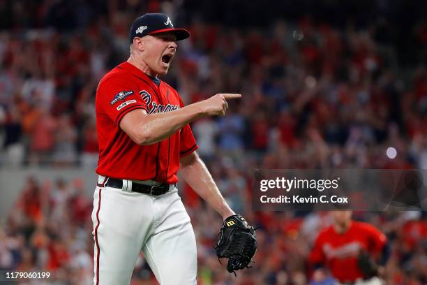 Mark Melancon of the Atlanta Braves reacts after the final out defeating the St. Louis Cardinals 3-0 in game two of the National League Division...