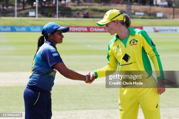 Meg Lanning of Australia and Shashikala Siriwardena of Sri Lanka during the coin toss ahead of Australia v Sri Lanka Women's ODI Game 1 the at Allan...