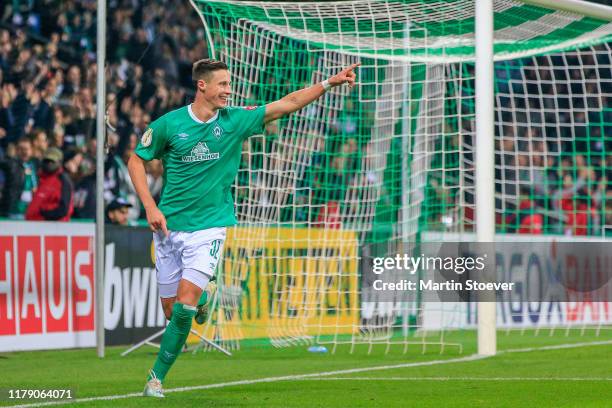 Marco Friedl of Bremen celebrates scoring his team's fourth goal during the DFB Cup second round match between Werder Bremen and 1. FC Heidenheim...